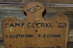 Trading Post Staff (camp clerks) staff plaque from 1953 at Camp Hinds. Located in the back room of the STEM Center.