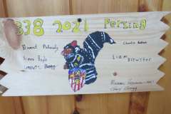 Troop 338 plaque from 2021 at Camp Hinds. They are from South Berwick and they stayed in Pershing. It is located in the Dining Hall.