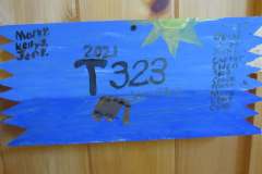 Troop 323 plaque from 2021 at Camp Hinds. Located in the dining hall.