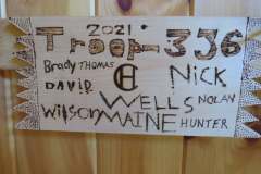 Troop 356 plaque from 2021 at Camp Hinds. They are from Wells. Located in the dining hall.