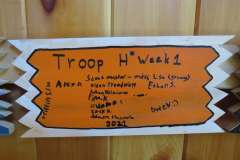 Troop H (Provo) plaque from 2021 at Camp Hinds. They stayed in Wilderness. Located in the dining hall.