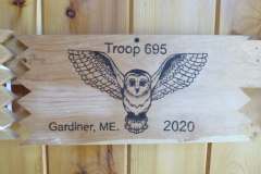 Troop 695 plaque from 2020 at Camp Hinds. They are from Gardiner. Located in the dining hall.