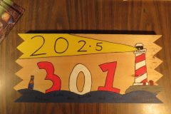 Troop 301 plaque from 2025 at Camp Hinds in the dining hall. Located in the dining hall.