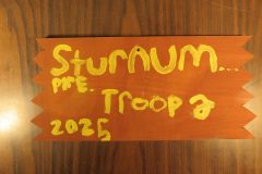 Troop 2 plaque from 2025 at Camp Hinds in the dining hall. Located in the dining hall.