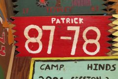 Troop 87 plaque from 1978 at Camp Hinds in Ring Hall. They stayed in Patrick campsite. Located in the rafters of bay 1 on the Tenny side of Ring Hall.