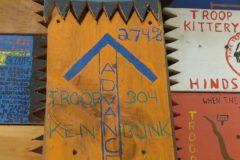 Troop 304 plaque from 1971 at Camp Hinds in Ring Hall. They stayed in Brownsea campsite. Located in the middle rafters of bay 1.