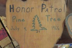 Troop 437 Honor Patrol (Baden Powell Award) Plaque from 1966 at Camp Hinds in Ring Hall. Located in the middle rafters of bay 1.