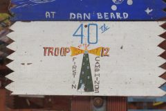 Troop 12 plaque from 1967 at Camp Hinds in Ring Hall. Located in the middle rafters of bay 1.