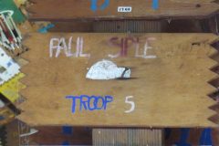Troop 5 plaque at Camp Hinds in Ring Hall. They stayed in Siple. Located in the middle rafters of bay 1.