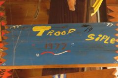 Troop 19 plaque at Camp Hinds in Ring Hall from 1977. They stayed in Siple. Located in the middle rafters of bay 1.