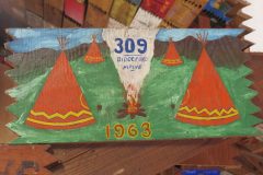 Troop 309 plaque from 1963 at Camp Hinds. They are from Brunswick. Located in the middle rafters of bay 1 of Ring Hall.