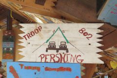 Troop 802 plaque from 1984 at Camp Hinds. They stayed in Pershing. Located in the middle rafters of bay 1 of Ring Hall.