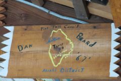 Troop 110 plaque from 1967 at Camp Hinds. They are from Lewiston and stayed in Dan Beard. Located in the middle rafters of bay 1 of Ring Hall.