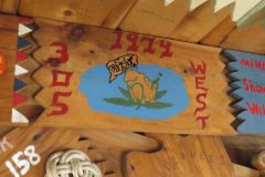 Troop 305 plaque from 1974 at Camp Hinds. They stayed in West. Located in the middle rafters of bay 1 of Ring Hall.