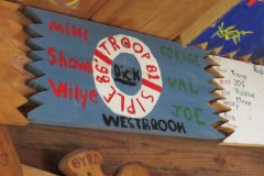Troop 81 plaque from 1986 at Camp Hinds. They are from Westbrook and stayed in Siple. Located in the middle rafters of Bay 1 in Ring Hall.